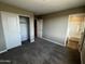 A bedroom with carpet, closet, and en-suite bath at 17558 W Lupine Ave, Goodyear, AZ 85338