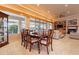 Charming dining room adjacent to the living room with seating for eight and large windows at 17642 N Ironhorse Dr, Surprise, AZ 85374