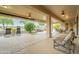 Open patio with a lounge chair and view of the outdoor space at 17642 N Ironhorse Dr, Surprise, AZ 85374