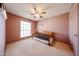 Bedroom featuring a window and a bed at 18660 N 71St Ln, Glendale, AZ 85308