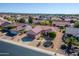 Aerial view of a single-Gathering home in a well-planned community, showcasing the desert landscape at 20047 N Shadow Mountain Dr, Surprise, AZ 85374