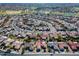 A nice aerial view showcases the neighborhood, golf course, and nearby lakes at 20047 N Shadow Mountain Dr, Surprise, AZ 85374