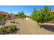 The desert landscaped yard is easy to care for and offers plenty of room at 20047 N Shadow Mountain Dr, Surprise, AZ 85374