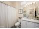 Bathroom featuring marble vanity and shower with glass door at 20047 N Shadow Mountain Dr, Surprise, AZ 85374