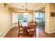 Bright dining area with modern lighting and view to the outdoors, perfect for gatherings at 20449 N Lemon Drop Dr, Maricopa, AZ 85138