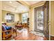 Cozy living room featuring hardwood floors, neutral paint, and comfortable furniture at 20449 N Lemon Drop Dr, Maricopa, AZ 85138