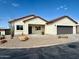 Beautiful single story home with desert landscaping and modern two-car garage at 2101 S Meridian Rd # 42, Apache Junction, AZ 85120