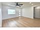 Light and airy living room featuring modern floors, recessed lighting, and a modern door at 2101 S Meridian Rd # 42, Apache Junction, AZ 85120