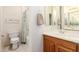 Bathroom featuring a single sink vanity with a wood cabinet at 26065 N 68Th Ln, Peoria, AZ 85383