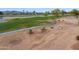 Beautiful golf course view with lush green fairways and mature trees at 2634 N 164Th Ave, Goodyear, AZ 85395