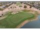 Picturesque aerial shot of a golf course with a lake and surrounding homes at 2634 N 164Th Ave, Goodyear, AZ 85395