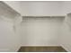 Walk-in closet with built-in shelving and ample storage space at 2746 S Harmony Ave, Gilbert, AZ 85295