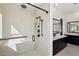 Modern bathroom with a glass-enclosed shower and dual vanities at 33949 N Borgata Trl, San Tan Valley, AZ 85144