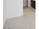 Bedroom featuring tile flooring, white walls, and a large window at 33949 N Borgata Trl, San Tan Valley, AZ 85144