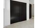 Modern closet doors with sleek black design at 33949 N Borgata Trl, San Tan Valley, AZ 85144