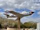 U.S. Air Force F-86 Sabre jet fighter displayed on a pedestal in a memorial park, symbolizing courage at 4102 E Crescent Way, Chandler, AZ 85249