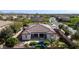 Backyard featuring a pool, putting green, and desert landscaping at 4102 E Crescent Way, Chandler, AZ 85249