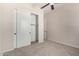 Neutral bedroom with carpet and a closet with white sliding doors and trim at 4102 E Crescent Way, Chandler, AZ 85249