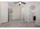 Spacious bedroom with neutral walls, carpeted floor and ceiling fan, illuminated by natural light at 4102 E Crescent Way, Chandler, AZ 85249