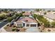 Charming home featuring a red tile roof, solar panels, and well-manicured landscaping at 4102 E Crescent Way, Chandler, AZ 85249