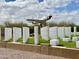 Striking outdoor art installation features sleek white columns, celebrating service and sacrifice in a desert setting at 4102 E Crescent Way, Chandler, AZ 85249