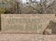 Veterans Oasis Park stone sign with block lettering is a landmark of this community green space at 4102 E Crescent Way, Chandler, AZ 85249