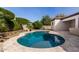 Pool featuring travertine tile coping and lush landscaping at 4102 E Crescent Way, Chandler, AZ 85249