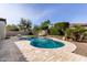 A refreshing swimming pool surrounded by lush landscaping and travertine tile at 4102 E Crescent Way, Chandler, AZ 85249