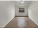 Bedroom with tile flooring and a ceiling fan at 42618 W Oakland Dr, Maricopa, AZ 85138