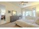 Comfortable bedroom featuring a ceiling fan, dresser, and an abundance of natural light at 4315 W Phalen Dr, New River, AZ 85087