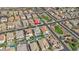 Wide aerial shot of a residential neighborhood with well-maintained houses and community green spaces at 4321 E Zion Way, Chandler, AZ 85249