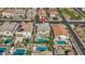 Aerial view of a home with a private pool, manicured backyard, and proximity to green spaces at 4321 E Zion Way, Chandler, AZ 85249