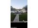 An inviting backyard featuring a pergola with a seating area on artificial turf at 4606 E Cheyenne Dr, Phoenix, AZ 85044