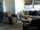 Comfortable living area showcasing modern furniture, artful decor, and natural lighting at 4606 E Cheyenne Dr, Phoenix, AZ 85044