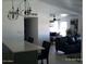 Cozy living room view from the kitchen with modern decor and comfortable seating at 4606 E Cheyenne Dr, Phoenix, AZ 85044