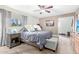 Serene main bedroom with soft carpeting, a ceiling fan, and natural light creating a relaxing atmosphere at 4901 N 85Th St, Scottsdale, AZ 85251