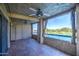 Covered balcony with red tiled floor offering scenic lake and golf course views at 5102 N 31St Pl # 436, Phoenix, AZ 85016