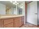 Bathroom featuring a vanity with double lighting and ample cabinet space at 5102 N 31St Pl # 436, Phoenix, AZ 85016