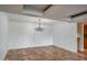 Bright dining room with traditional chandelier and beautiful red tile floors at 5102 N 31St Pl # 436, Phoenix, AZ 85016