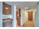 Hallway to unit features tile flooring and warm wood tones at 5102 N 31St Pl # 436, Phoenix, AZ 85016