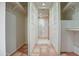 Spacious walk-in closet with built-in shelving and access to the bathroom at 5102 N 31St Pl # 436, Phoenix, AZ 85016