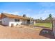 Well-maintained backyard features gravel, patio space, and grass, great for outdoor activities at 5255 W Caribbean Ln, Glendale, AZ 85306