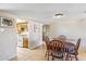 Dining area featuring a table with seating for four and access to the kitchen at 5255 W Caribbean Ln, Glendale, AZ 85306