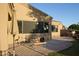 Outdoor patio seating area, perfect for entertaining, includes an outdoor kitchen and desert views at 6832 S 38Th S Pl, Phoenix, AZ 85042