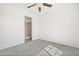 Bedroom showcasing sunlight from the window with an ensuite bath at 7815 W Monte Vista Rd, Phoenix, AZ 85035