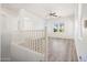 Bright living room with wood-look floors and natural light at 7815 W Monte Vista Rd, Phoenix, AZ 85035