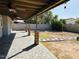 Spacious covered backyard patio with ceiling fans and beautiful brick pillars at 8139 W Columbine Dr, Peoria, AZ 85381