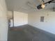 Clean garage with water heater, ample room for storage, and an automatic door opener at 8255 E Kiva Ave # 424, Mesa, AZ 85209