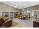 Formal dining room featuring tile floors, high ceilings, and custom built-in cabinets at 9331 E Mclellan Rd, Mesa, AZ 85207