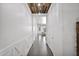 Hallway with wood floors and ceiling accents leading to a living area at 993 E Knightsbridge Way, Gilbert, AZ 85297